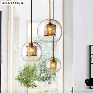 Modern Clear Glass Orb Pendant Light with Mesh Cage - Stylish Ceiling Hanging Lamp